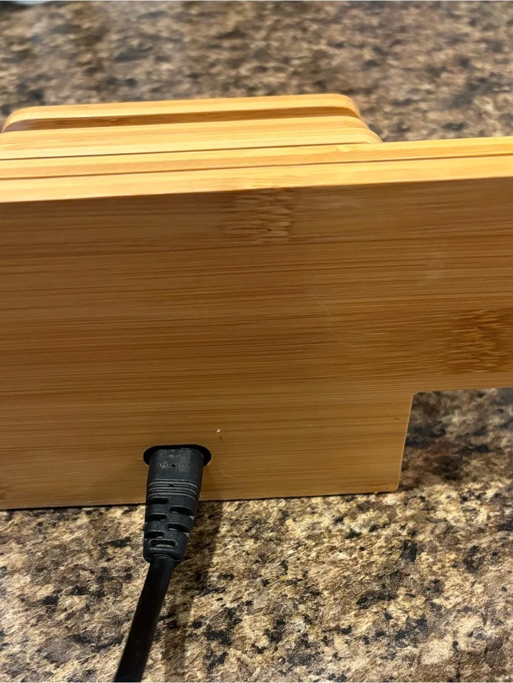 Bamboo organizer charging station with Apple Watch holder and 5 usb ports.